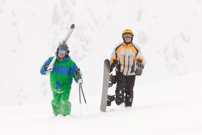 photo of two young men skiing - hired power breakaway adventure