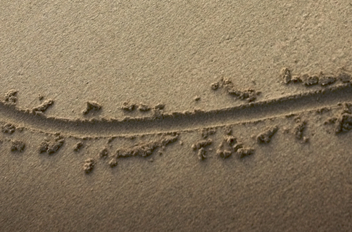 photo of a line in the sand - boundaries in recovery - hired power breakaway