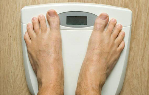 photo of feet on a weight scale - bulimia eating disorder - breakaway hired power