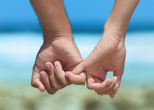 photo of two people holding hands - healthy relationships in recovery - hired power breakaway