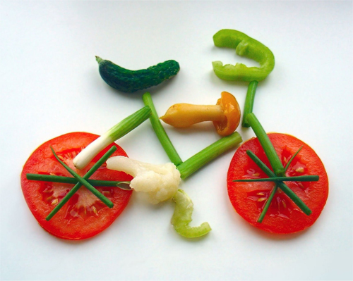photo of a bicycle made out of vegetable slices - self care in recovery - hired power breakaway